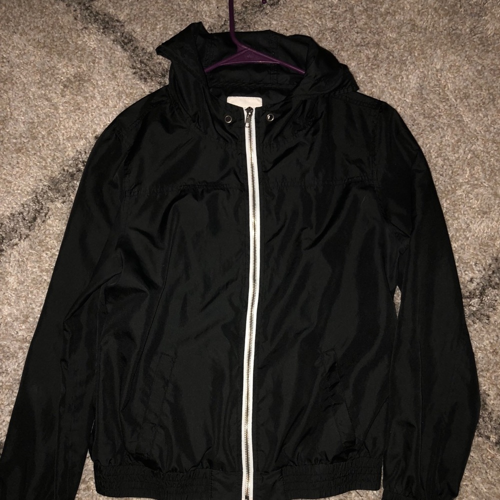 black windbreaker